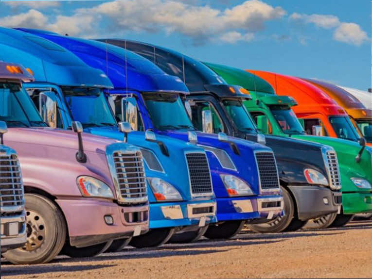 image of different colored trucks parked side by side