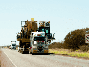 Oversized Load truck driving down highway