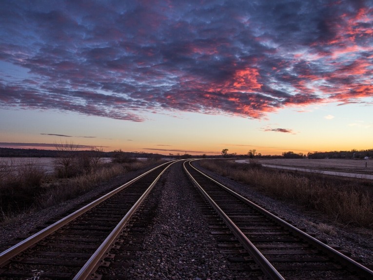 Union Pacific railroad underneath sunset sky