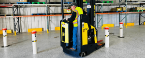 Warehouse instructor on forklift