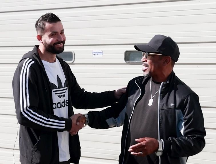 Mohamad Aly and Ricky Taylor shake hands