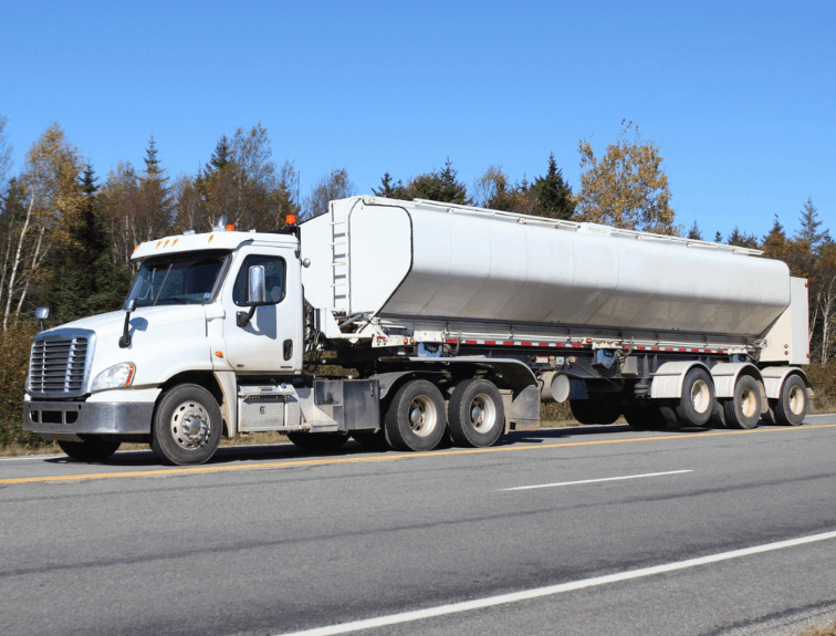 Tanker truck parked on open roadway